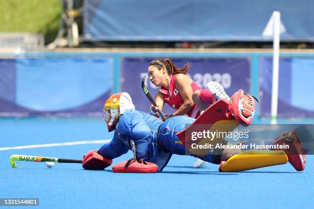 Yuri Nagai of Team Japan competes for the ball against Tarryn Davey of Team New Zealand during the Women's Preliminary Pool B match between Japan and...