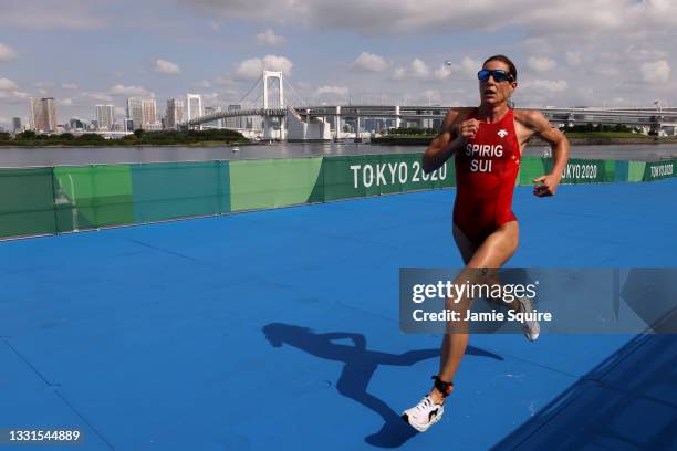 Nicola Spirig of Team Switzerland competes during the Mixed Relay Triathlon on day eight of the Tokyo 2020 Olympic Games at Odaiba Marine Park on...
