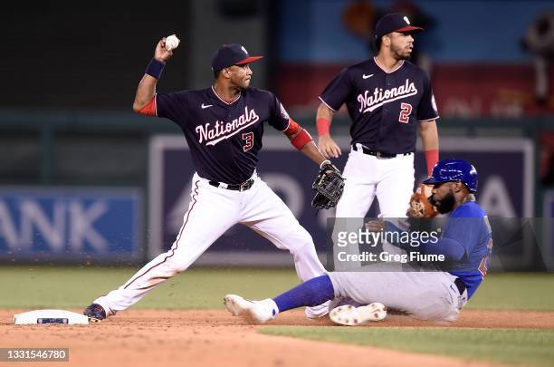 Alcides Escobar of the Washington Nationals forces out Jason Heyward of the Chicago Cubs to start a double play in the ninth at Nationals Park on...
