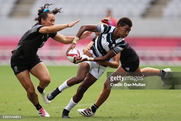 Reapi Ulunisau of Team Fiji is tackled by Portia Woodman of Team New Zealand in the Women’s Semi Final match between Team New Zealand and Team Fiji...