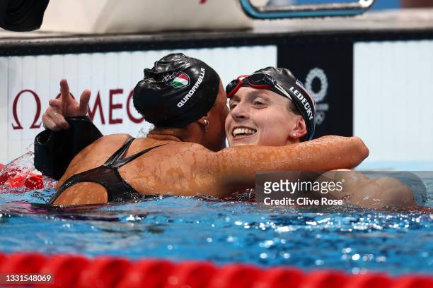 Katie Ledecky of Team United States is congratulated by Simona Quadarella of Team Italy after winning gold in the Women's 800m Freestyle Final at...