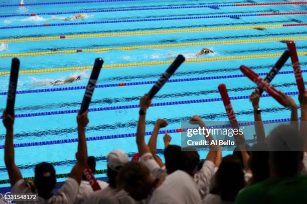 Katie Ledecky of Team United States leads Ariarne Titmus of Team Australia and Simona Quadarella of Team Italy during the Women's 800m Freestyle...