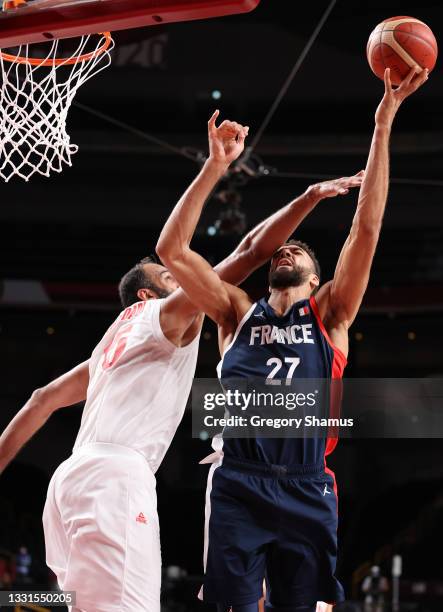 Rudy Gobert of Team France shoots against Hamed Haddadi of Team Iran during the second half of a Men's Basketball Preliminary Round Group A game on...