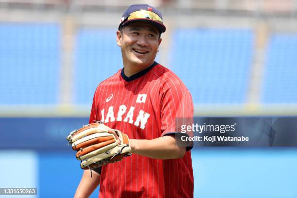 Masahiro Tanaka of Team Japan warms up before the game against Team Mexico during the baseball opening round Group A game on day eight of the Tokyo...