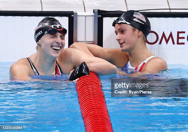 Gold medalist Katie Ledecky laughs with Katie Grimes, both of Team United States, after competing in the Women's 800m Freestyle Final at Tokyo...