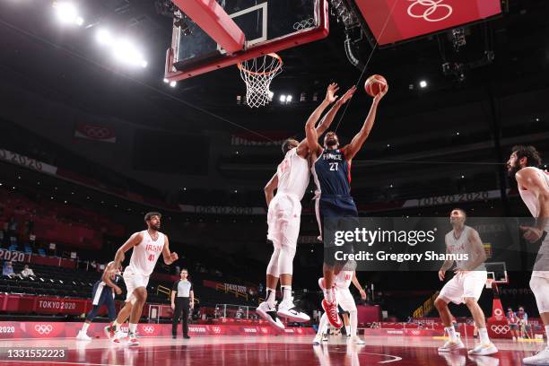 Rudy Gobert of Team France goes up for a shot against Hamed Haddadi of Team Iran during the second half of a Men's Basketball Preliminary Round Group...