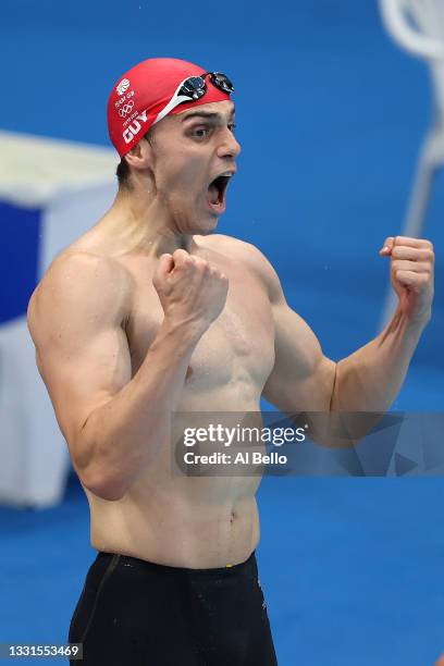 James Guy of Team Great Britain celebrates winning gold in the Mixed 4 x 100m Medley Relay Final at Tokyo Aquatics Centre on July 31, 2021 in Tokyo,...
