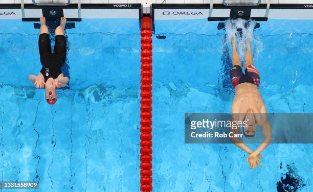 Kathleen Dawson of Team Great Britain and Ryan Murphy of Team United States compete in the Mixed 4 x 100m Medley Relay Final at Tokyo Aquatics Centre...