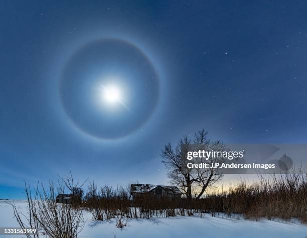 lunar halo over the farm house - halo stock pictures, royalty-free photos & images