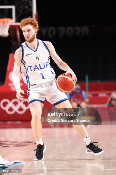 Niccolo Mannion of Team Italy brings the ball up court against Nigeria during the first half of a Men's Basketball Preliminary Round Group B game on...