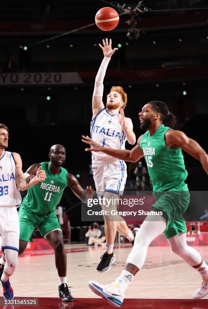Niccolo Mannion of Team Italy shoots the ball against Nigeria during the first half of a Men's Basketball Preliminary Round Group B game on day eight...