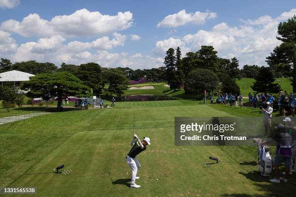 Jazz Janewattananond of Team Thailand plays his shot from the tenth tee during the third round of the Men's Individual Stroke Play on day eight of...