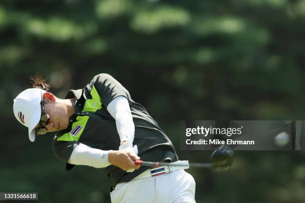 Jazz Janewattananond of Team Thailand plays his shot from the 13th tee during the third round of the Men's Individual Stroke Play on day eight of the...