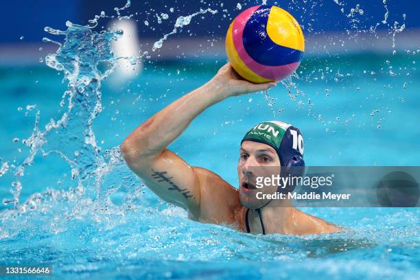 Denes Varga of Team Hungary in action during the Men's Preliminary Round Group A match between the United States and Hungary on day eight of the...