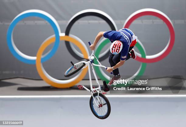 Justin Dowell of Team USA in action in front of the Olympic rings logo during the Men's BMX Freestyle seeding event on day eight on day eight of the...