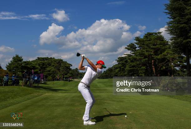 Carlos Ortiz of Team Mexico plays his shot from the 13th tee during the third round of the Men's Individual Stroke Play on day eight of the Tokyo...