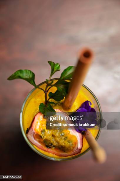 passion fruit shakes with bamboo tube - passion fruit flower images stock pictures, royalty-free photos & images