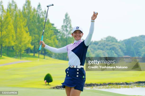 Yuri Yoshida of Japan celebrates winning the tournament on the 18th green during the final round of Rakuten Super Ladies at Tokyu Grand Oak Golf Club...