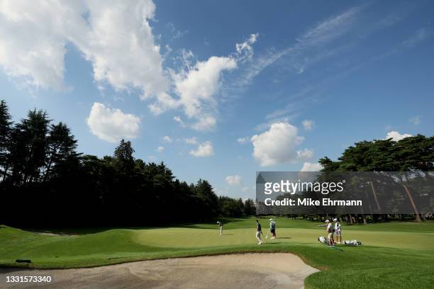 Shane Lowry of Team Ireland putts on the 17th hole during the third round of the Men's Individual Stroke Play on day eight of the Tokyo 2020 Olympic...