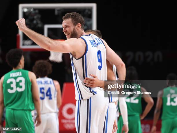 Nicolo Melli of Team Italy celebrate a win Nigeria following a Men's Basketball Preliminary Round Group B game on day eight of the Tokyo 2020 Olympic...