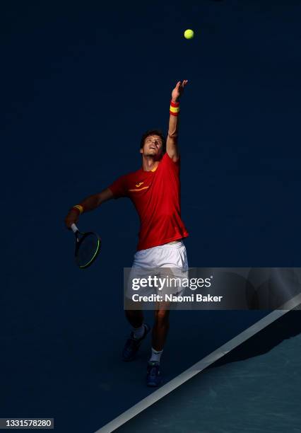 Pablo Carreno Busta of Team Spain serves during his Men's Singles Bronze Medal match against Novak Djokovic of Team Serbia on day eight of the Tokyo...
