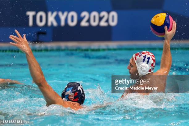 Paulo Obradovic of Team Croatia on attack during the Men's Preliminary Round Group B match between Croatia and Serbia on day eight of the Tokyo 2020...