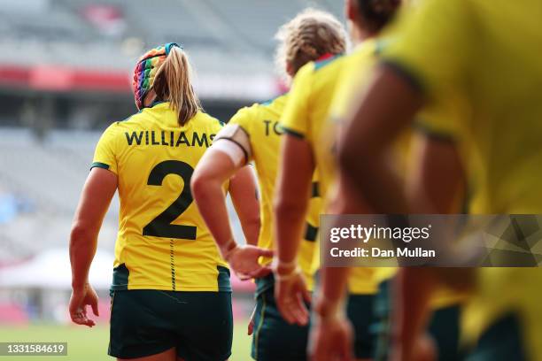 Sharni Williams of Team Australia leads out Team Australia in the Women’s Placing 5-6 match between Team Australia and Team United States during the...