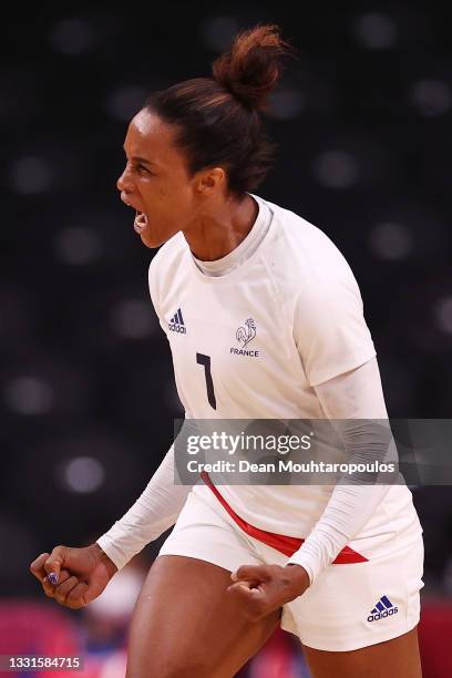 Allison Pineau of Team France celebrates after scoring a goal during the Women's Preliminary Round Group B handball match between ROC and France on...