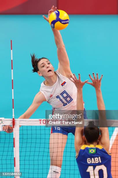 Tijana Boskovic of Team Serbia strikes against Team Brazil during the Women's Preliminary - Pool A volleyball on day eight of the Tokyo 2020 Olympic...