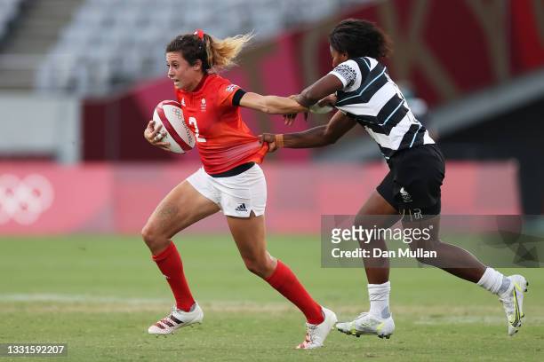 Abbie Brown of Team Great Britain is tackled by Raijieli Daveua of Team Fiji in the Women’s Semi Final match between Team Fiji and Team Great Britain...
