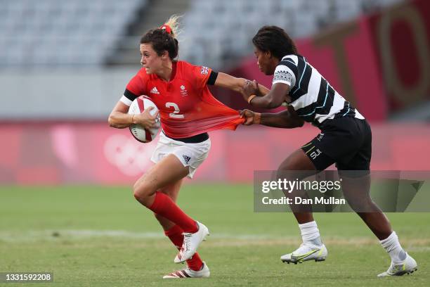 Abbie Brown of Team Great Britain is tackled by Raijieli Daveua of Team Fiji in the Women’s Semi Final match between Team Fiji and Team Great Britain...