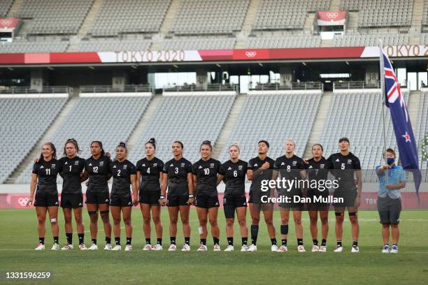 Team New Zealand line up for the national anthems before the Women’s Gold Medal match between Team New Zealand and Team France during the Rugby...