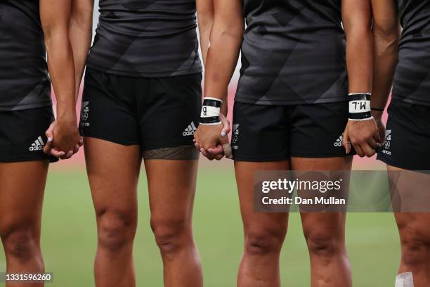 Team New Zealand line up for the national anthems before the Women’s Gold Medal match between Team New Zealand and Team France during the Rugby...