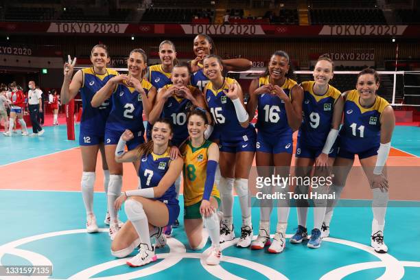 Team Brazil celebrates after defeating Team Serbia during the Women's Preliminary - Pool A volleyball on day eight of the Tokyo 2020 Olympic Games at...