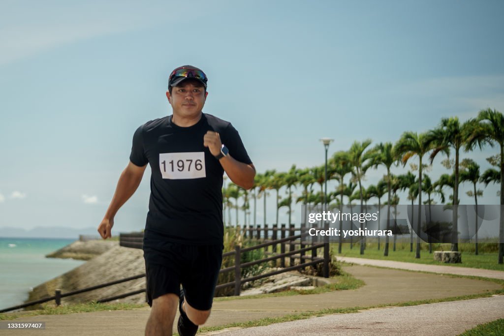 Man running in a running competition