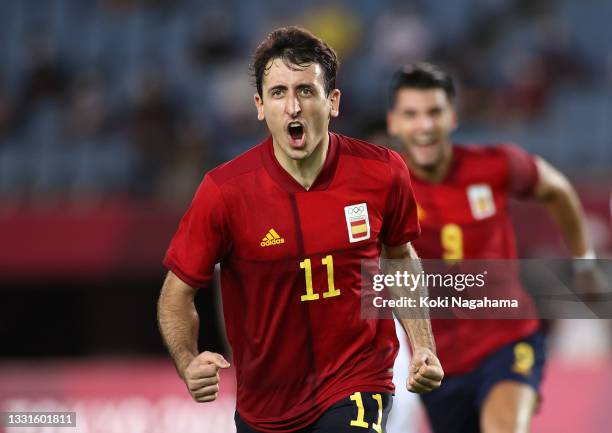 Mikel Oyarzabal of Team Spain celebrates after scoring their side's third goal from the penalty spot during the Men's Quarter Final match between...
