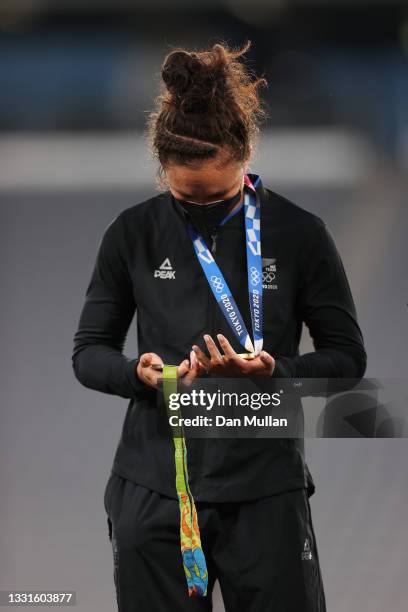 Gold medalist Ruby Tui of Team New Zealand celebrates with her gold medal and also her silver medal from the RIO 2016 Olympic Games during the...