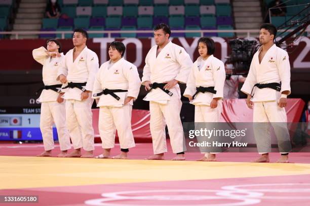 Team Japan look dejected after they were defeated by Team France during the Mixed Team Final on day eight of the Tokyo 2020 Olympic Games at Nippon...