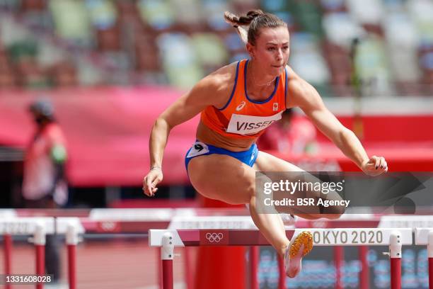 Nadine Visser of the Netherlands competes during the Women's 100m Hurdles Round 1 during the Tokyo 2020 Olympic Games at the Olympic Stadium on July...