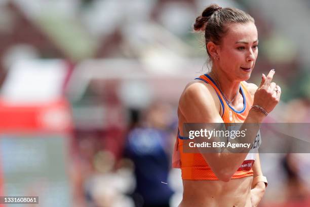 Nadine Visser of the Netherlands competes during the Women's 100m Hurdles Round 1 during the Tokyo 2020 Olympic Games at the Olympic Stadium on July...