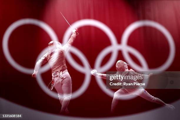 Olga Nikitina of Team ROC competes against Charlotte Lembach of Team France during the Women's Sabre Team Fencing Gold Medal Match on day eight of...