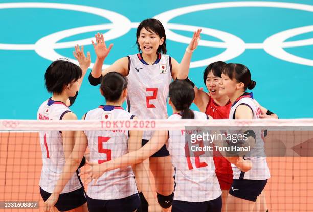 Sarina Koga of Team Japan reacts with team mates against Team South Korea during the Women's Preliminary - Pool A volleyball on day eight of the...