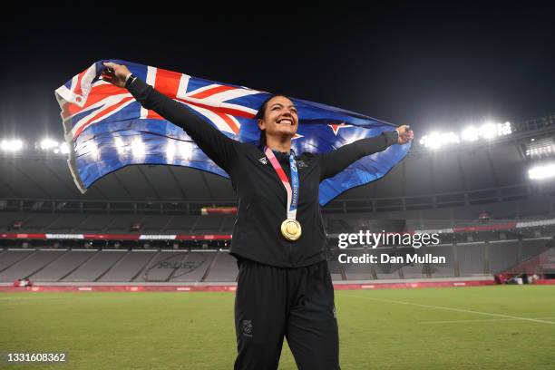 Gold medalist Stacey Fluhler of Team New Zealand celebrates with her gold medal after the Women’s Rugby Sevens Medal Ceremony on day eight of the...