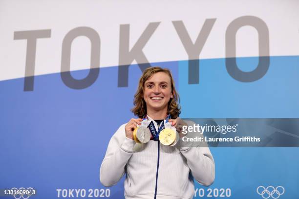Katie Ledecky of Team USA poses with her two Gold and two Silver medals after a giving a press conference to the media during the Tokyo Olympic Games...