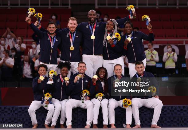 Gold Medalists Team France pose on the podium with their gold medals for Judo the Mixed Team Final on day eight of the Tokyo 2020 Olympic Games at...