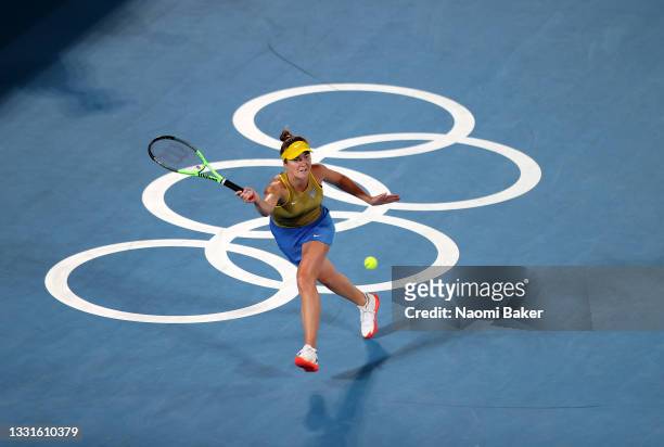 Elina Svitolina of Team Ukraine plays a forehand during her Women's Singles Bronze Medal match against Elena Rybakina of Team Kazakhstan on day eight...