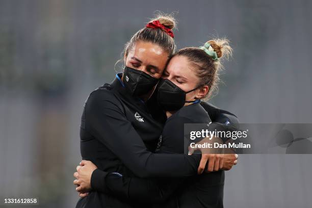 Gold medalists Sarah Hirini and Michaela Blyde of Team New Zealand celebrate with their gold medals during the Women’s Rugby Sevens Medal Ceremony on...