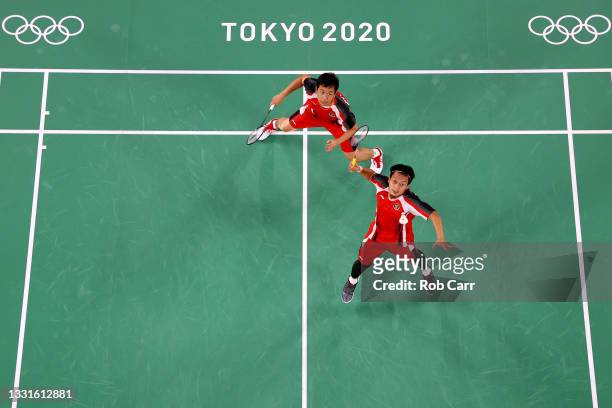 Mohammad Ahsan and Hendra Setiawan of Team Indonesia compete against Aaron Chia and Soh Wooi Yik of Team Malaysia during the Men’s Doubles Bronze...