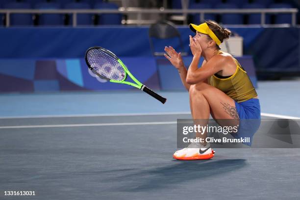 Elina Svitolina of Team Ukraine celebrates victory in her Women's Singles Bronze Medal match against Elena Rybakina of Team Kazakhstan on day eight...