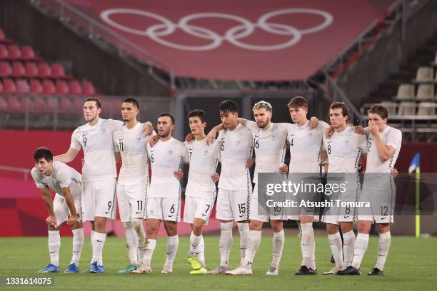 Players of Team New Zealand react during the penalty shoot out during the Men's Quarter Final match between Japan and New Zealand on day eight of the...